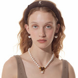 Paradise / Bear Head Bow Pearl Necklace