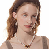 Paradise / Bear Head Bow Pearl Earrings