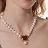 Paradise / Bear Head Bow Pearl Necklace