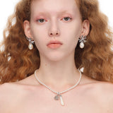 YVMIN X SHUSHUTONG / Baroque Pearl Bow Earring