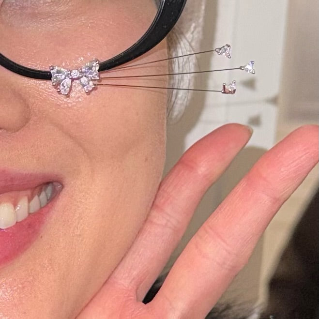 Close-up of jewelry worn in an everyday moment