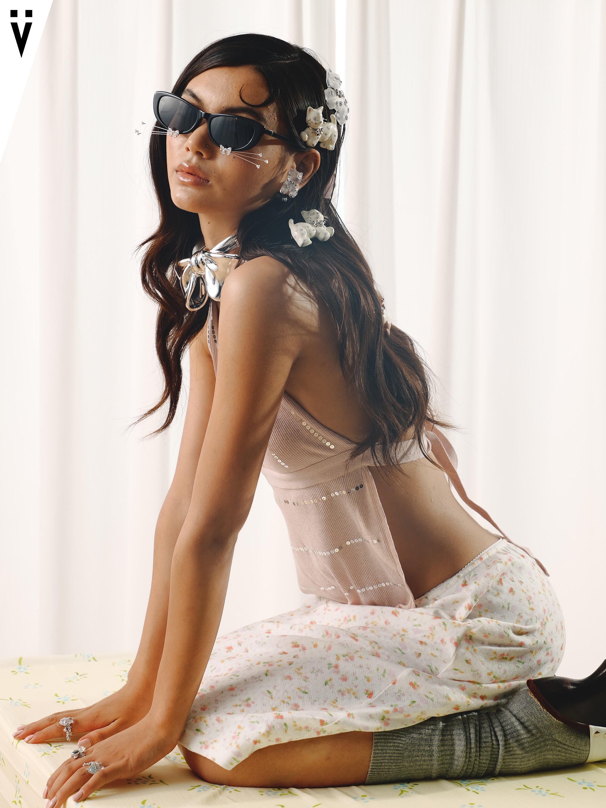 YVMIN campaign: model wearing cat clips, earrings and whisker eyewear