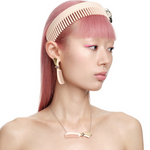 YVMIN X Ashley Williams Meteor Comb stud earrings with celestial-inspired metal design