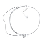 YVMIN Ripple Liquefied Butterfly Layers Choker featuring layered, wavy butterfly-shaped design in metallic finish.
