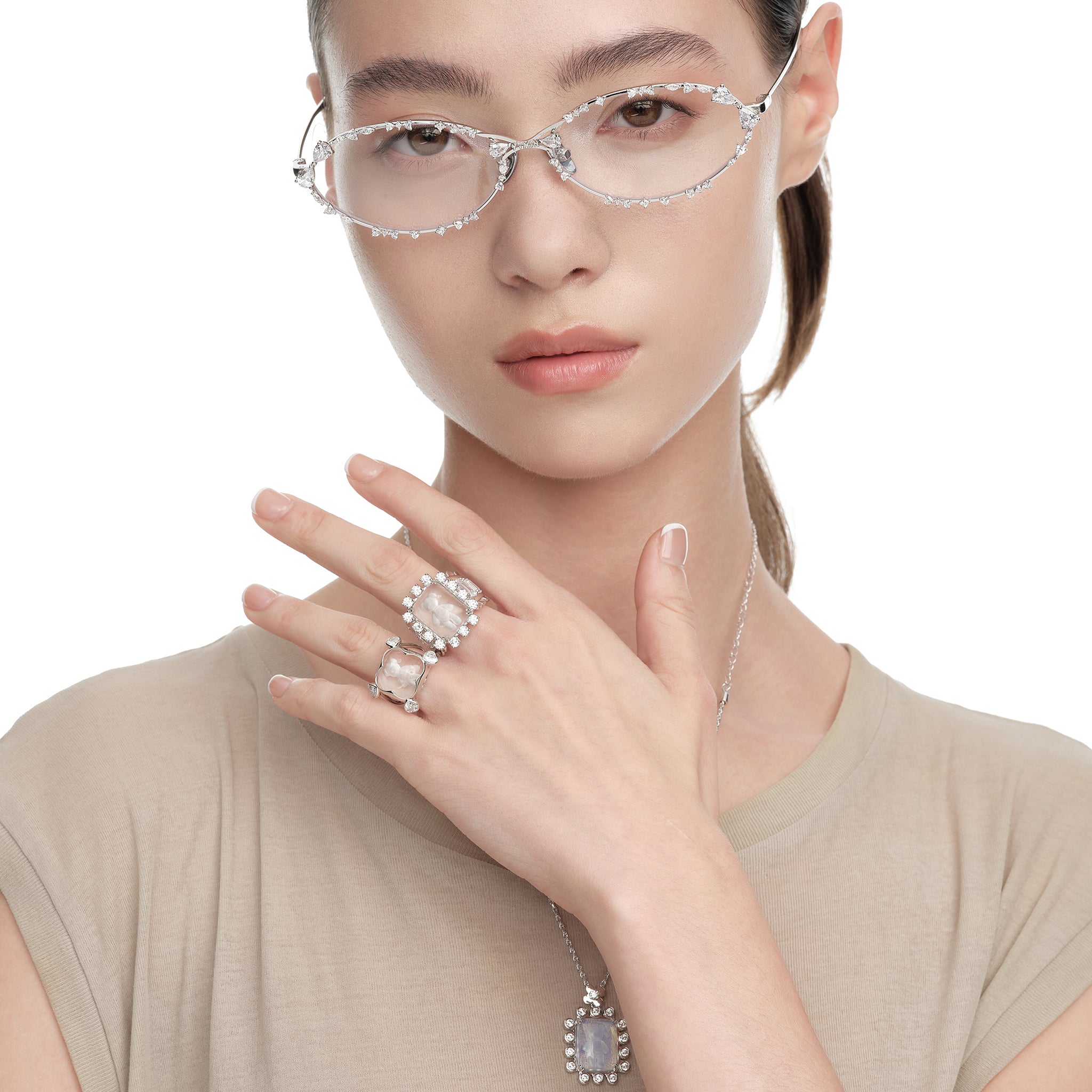 YVMIN Paradise Four-Claw Crystal Bear Ring featuring a detailed bear design with sparkling crystal accents and silver band.