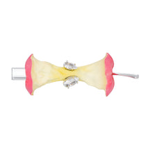 YVMIN Paradise Apple Core Hair Clip showing a decorative hair accessory with a gold-tone apple core design.