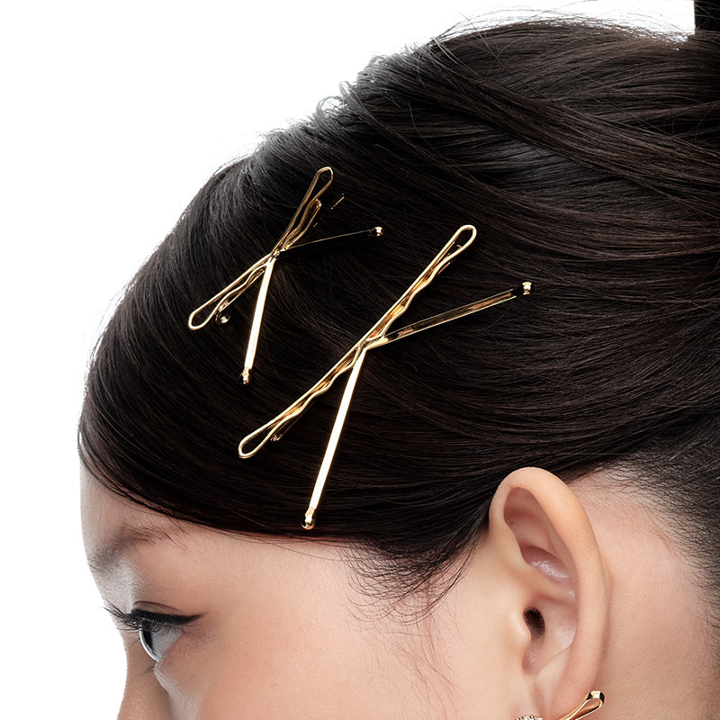 YVMIN metal bowknot hair clips with shiny silver finish, stylish and elegant hair accessories for women.