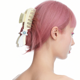 YVMIN X Ashley Williams Meteor Comb Claw Clip hair accessory in a sculptural meteor-inspired design