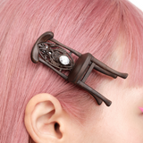 YVMIN X Ashley Williams chair hair clip, playful chair-shaped hair accessory in silver tone