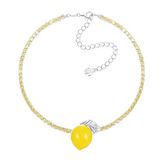 Shop YVMIN  Lemon Necklace. Iconic jewelry worn by aespa members Karina, Winter, Giselle, and Ningning. Elevate your K-pop fashion with this futuristic style.