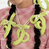 Paradise / Apple Peel Bow Pearl Necklace