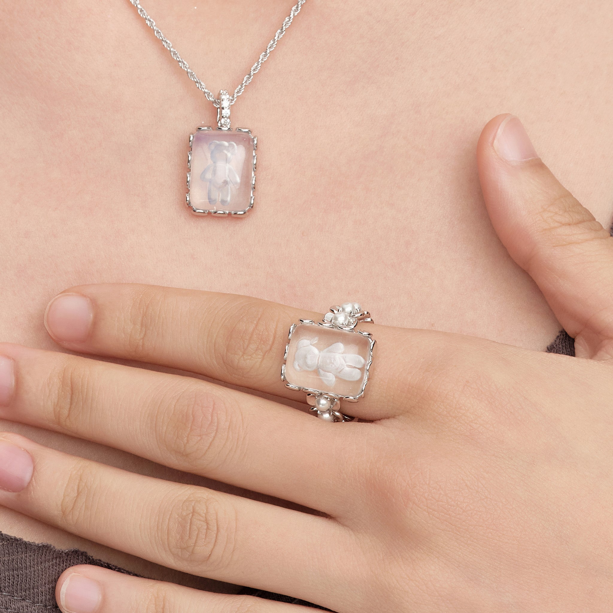 YVMIN Paradise Crystal Bear Lace Pearl Ring featuring intricate lace design, pearl accents, and a sparkling crystal bear embellishment.