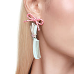 YVMIN X Ashley Williams bowknot comb earring with delicate bow design and gold-tone finish, stylish accessory for pierced ears.