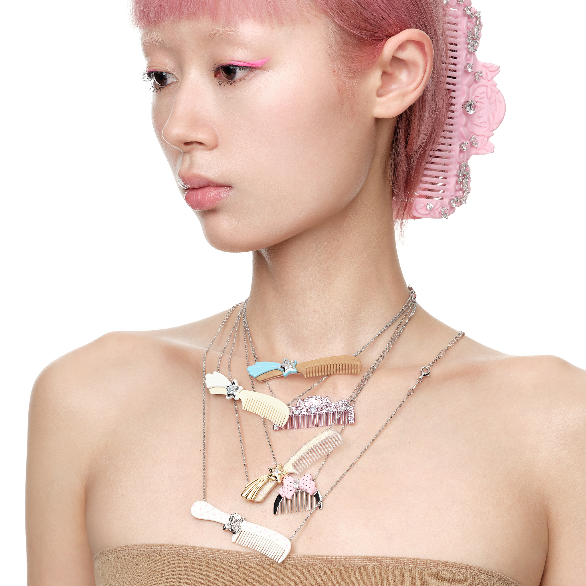 YVMIN X Ashley Williams Meteor Comb Necklace with silver meteor and comb-inspired pendant detail