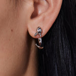 YVMIN island and interlocking dolphin stud earrings featuring silver-tone metal and detailed dolphin designs.