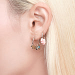 YVMIN X Ashley Williams star-shaped earring featuring a sleek gold finish and modern design, close-up of its stylish details.