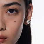 YVMIN pearl stud earrings featuring island and dolphin relief designs, elegant and stylish jewelry for everyday wear.