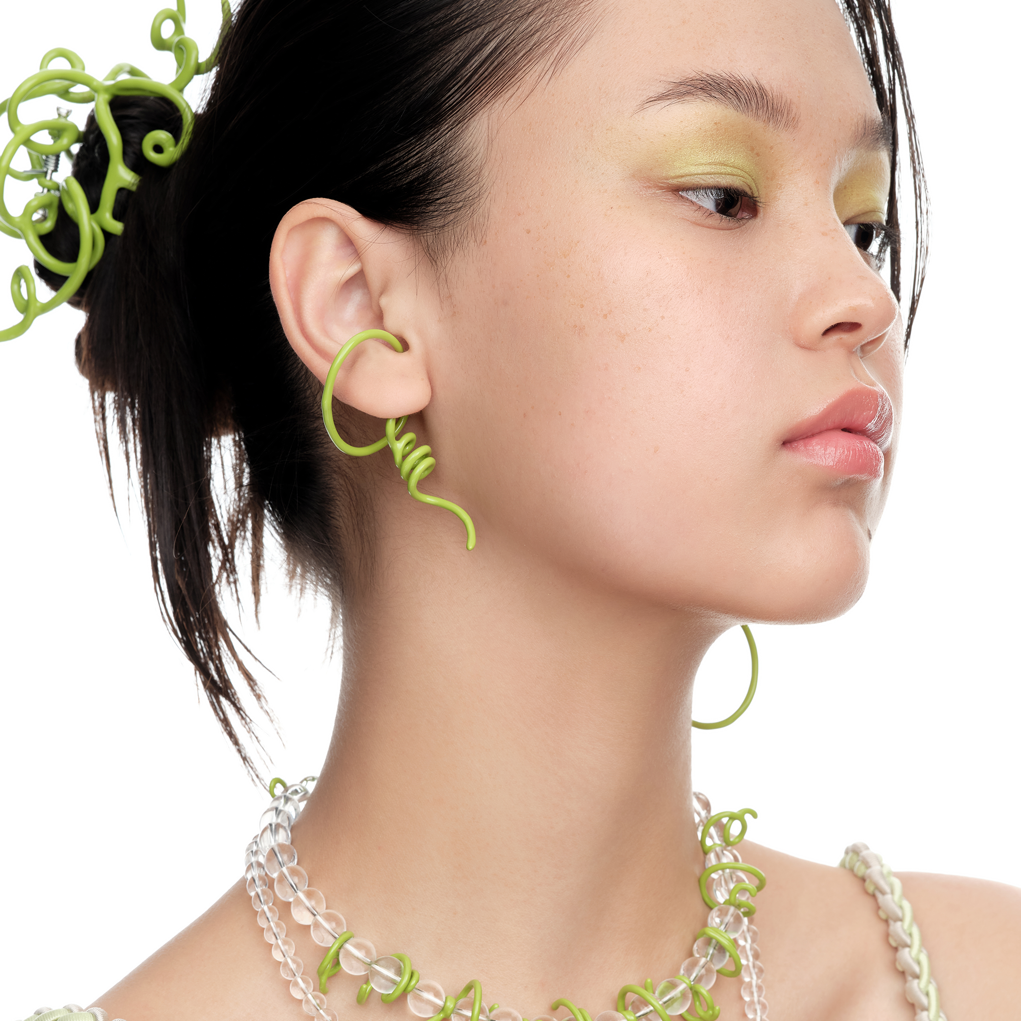 YVMIN Paradise Vines Earring featuring intricate vine design with gold-tone finish and dangling leaf accents.