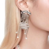 YVMIN Ashley Williams Chair Earring featuring a unique, artistic design in gold and black, perfect for stylish accessory looks.