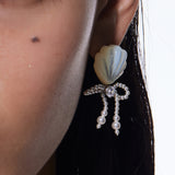 YVMIN carved shell pearl bow stud earrings featuring island-inspired design and elegant craftsmanship.
