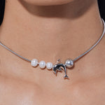 YVMIN Island Dolphin Pearl Snake Bone Necklace featuring a detailed dolphin and pearl pendant on a snake bone chain.