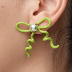 YVMIN Paradise Vines Bowknot Earring featuring a delicate bowknot design with vine details on shiny metal.