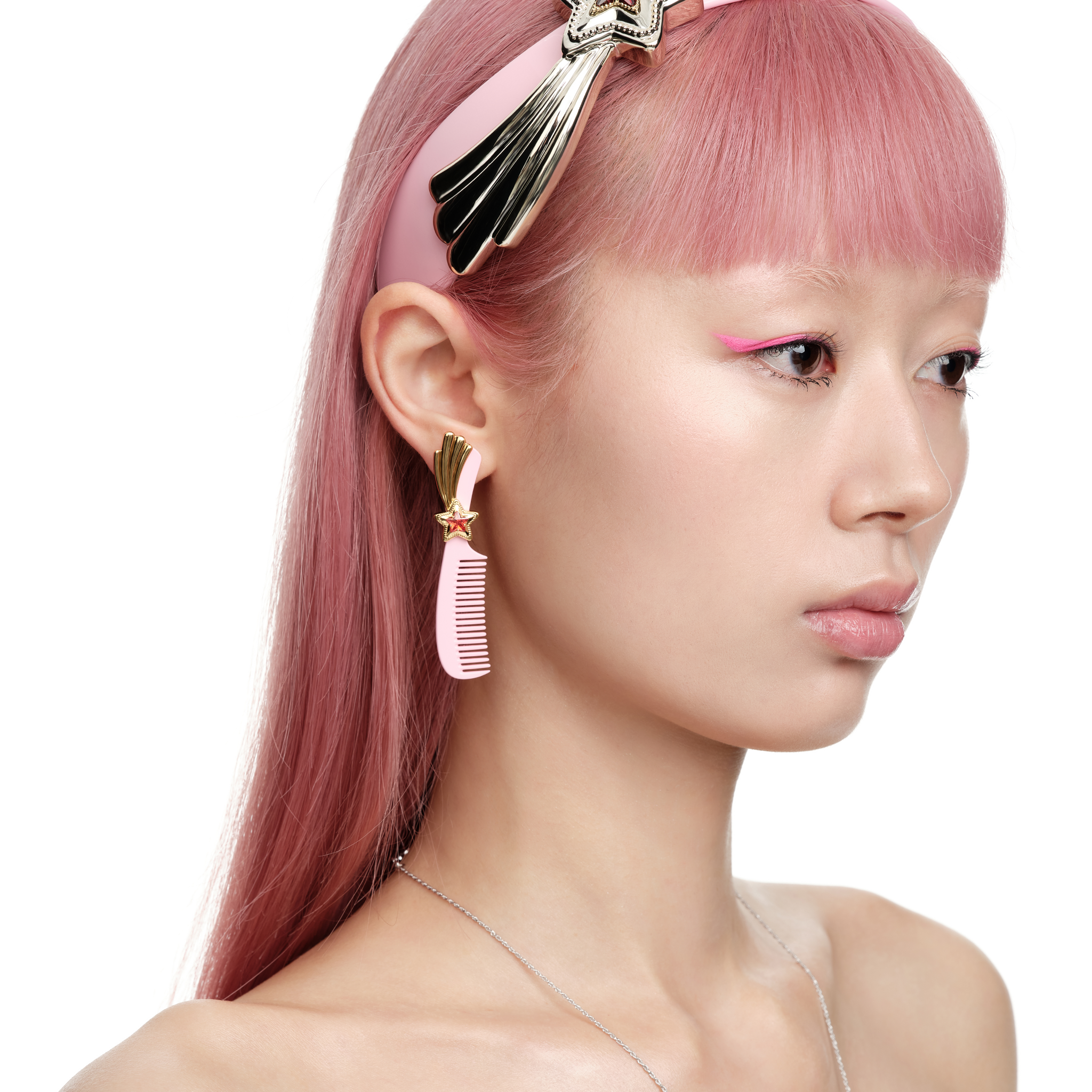 YVMIN X Ashley Williams Meteor Comb stud earrings with silver-toned star and comb details