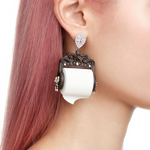 YVMIN X Ashley Williams Scroll Earrings with sculptural curled design and polished metallic finish