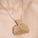 YVMIN X Ashley Williams Crying Bear Comb Necklace with sculpted bear pendant and comb details
