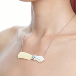 YVMIN X Ashley Williams Meteor Comb Necklace with celestial meteor and comb-inspired pendant design