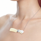 YVMIN X Ashley Williams Meteor Comb Necklace with celestial meteor and comb-inspired pendant design