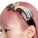 YVMIN X Ashley Williams Meteor Comb Headband hair accessory with sculptural metallic meteor design