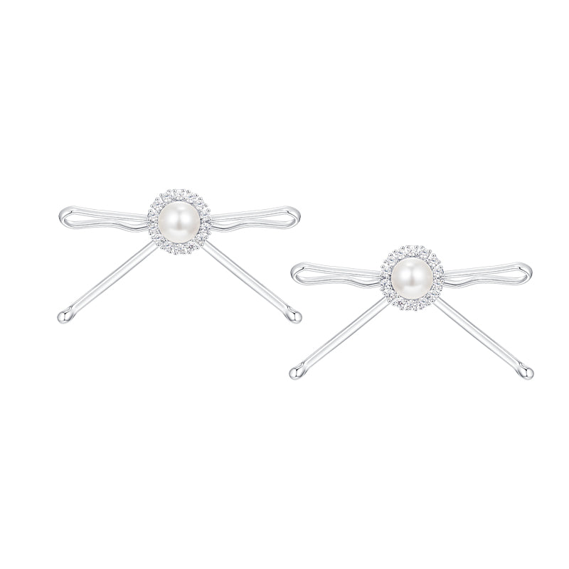 YVMIN X SHUSHUTONG metal clips bowknot earrings with silver finish, showcasing elegant and stylish jewelry design.