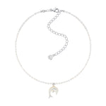 YVMIN carved mother-of-pearl dolphin necklace featuring natural pearls, showcasing detailed dolphin pendant and lustrous pearl beads