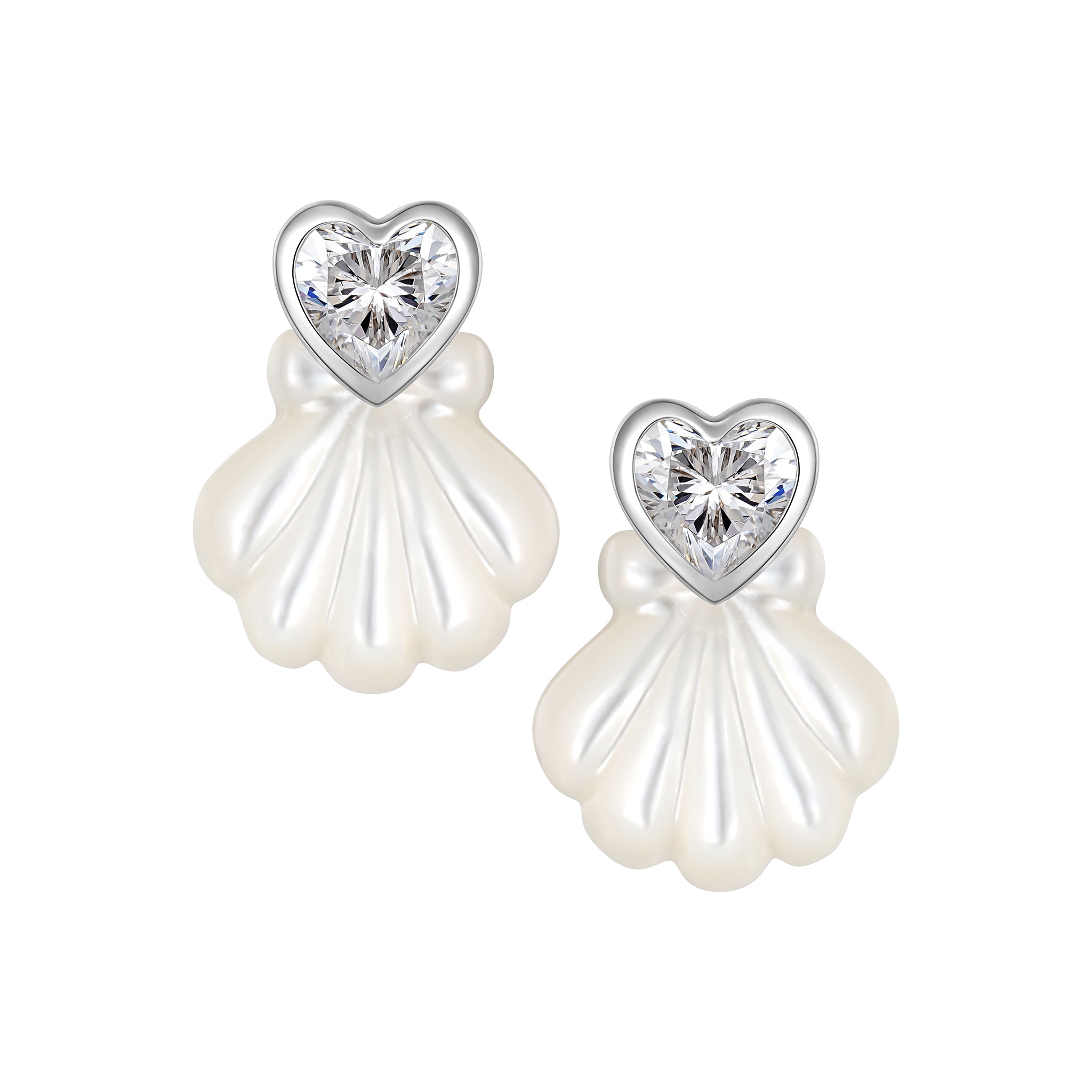 YVMIN carved shell stud earrings featuring island and heart-shaped gems with intricate detailing and a polished finish.