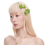 YVMIN Paradise Grass Bear Hair Clip featuring a cute bear design with green grass accents, ideal for stylish hair accessories.