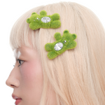 YVMIN Paradise Grass Bear Hair Clip with green grass design and bear-shaped embellishment, perfect for adding a cute touch to hairstyles.