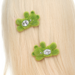 YVMIN Paradise Grass Bear Hair Clip featuring a cute bear design with green grass details, perfect for adding charm to hairstyles.