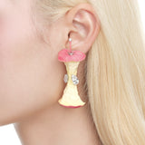 YVMIN Paradise / Apple Core earring worn by a model, showcasing a stylish gold hoop with a unique apple core design.