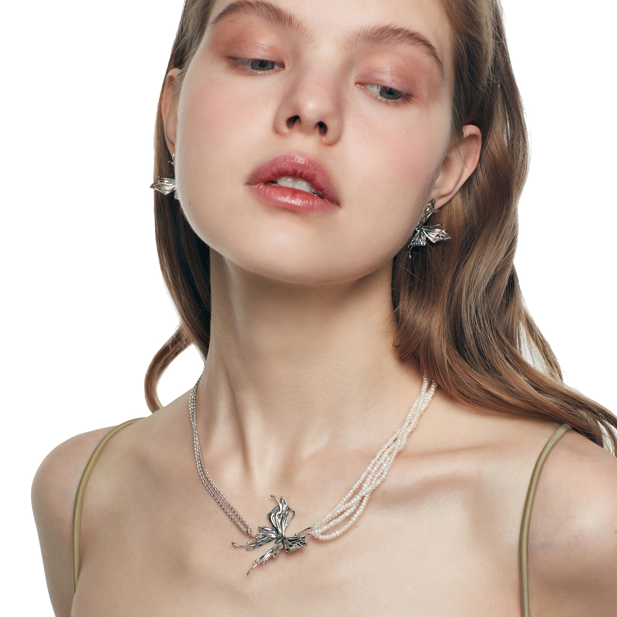 YVMIN Ripple Liquefied Butterfly Layers Pearl Chain Necklace showing layered pearl chains and butterfly-shaped design.